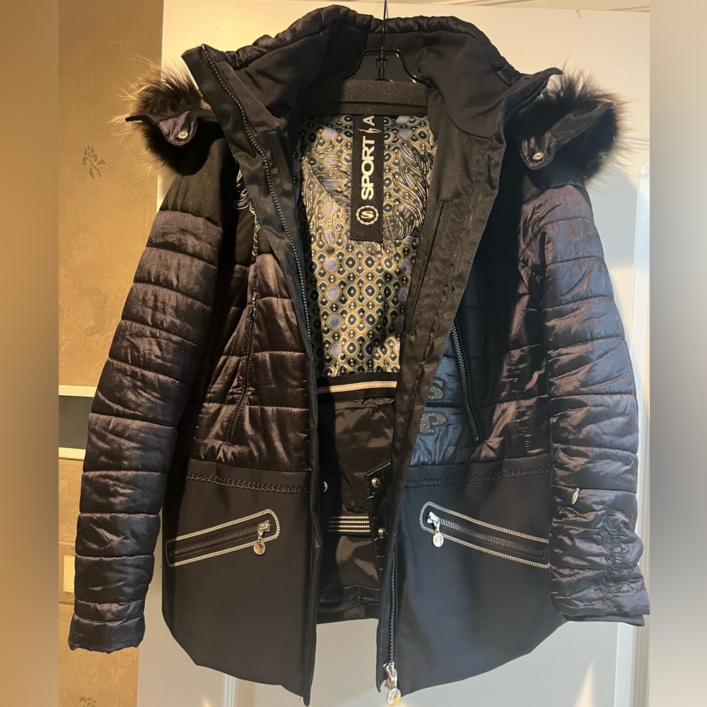 Luxurious Sportalm ski jacket with silver fox hood